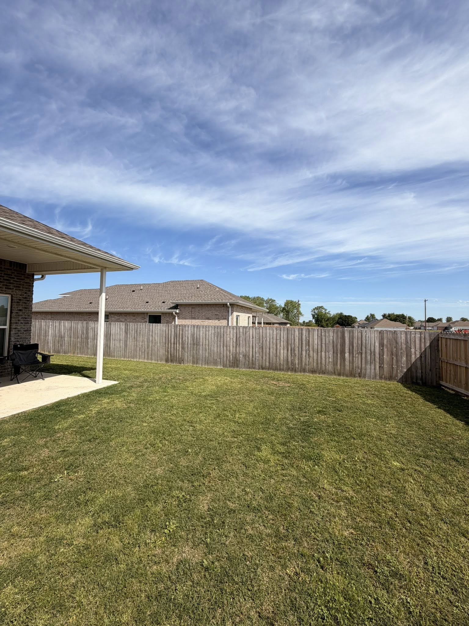Clean front yard with sidewalk edging